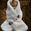 Thumbnail: Super soft faux fur Collar / wrap in Cream with gold coloured fastening