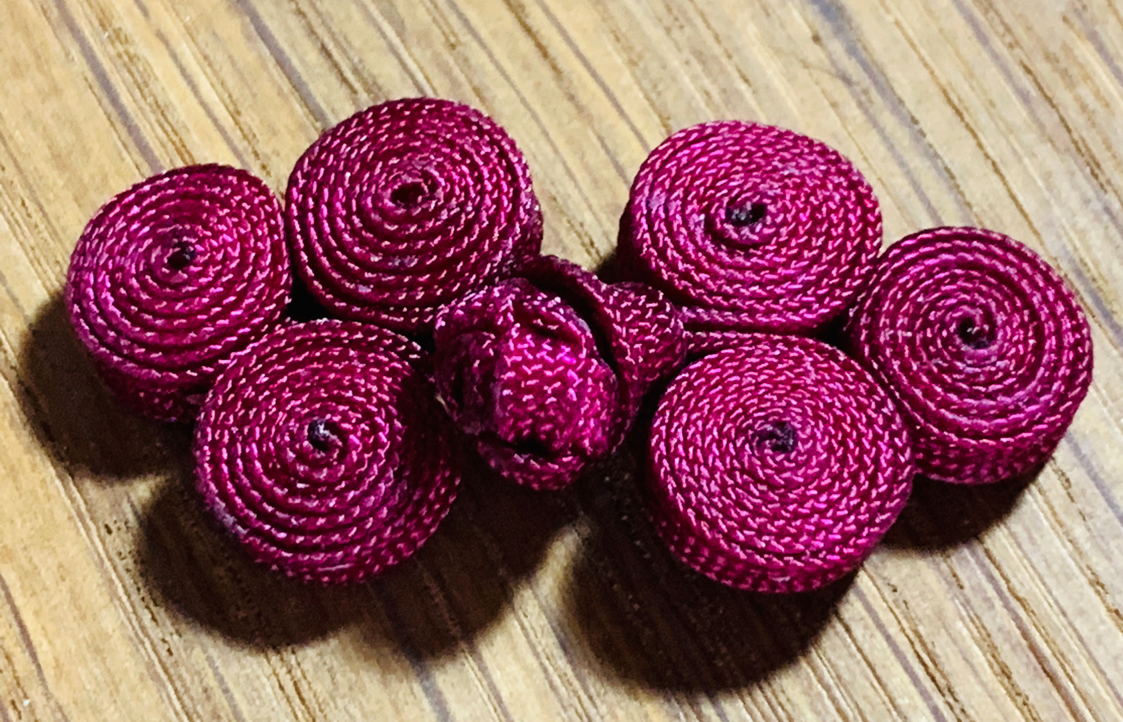 One pair of mini maroon frog fastenings
