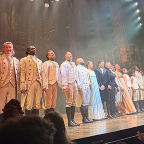 cast bowing at the end of the show