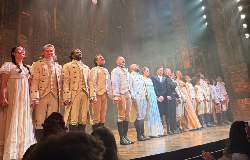 cast bowing at the end of the show