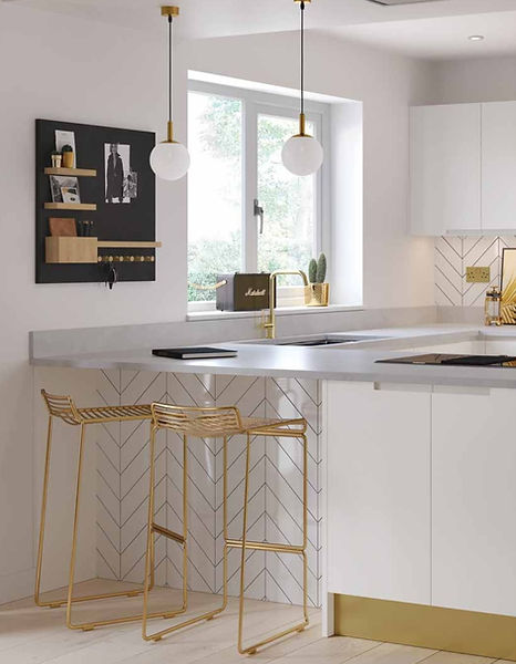 Modern white kitchen with gold bar stools