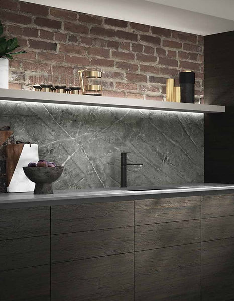 Modern kitchen design with brick wall and sleek cabinetry