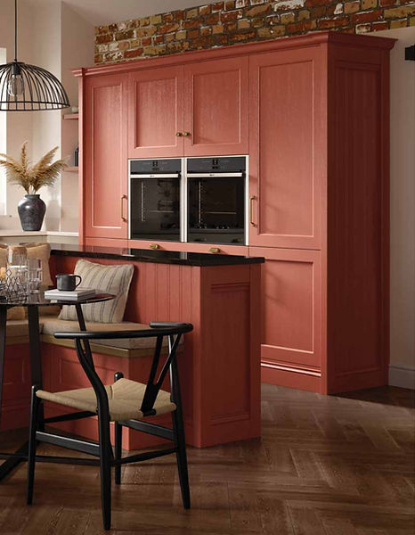 Coral Shaker kitchen units with integrated ovens