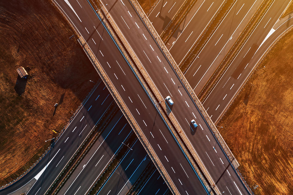 aerial-shot-of-cars-on-freeway-overpass-from-drone-2023-11-30-20-23-24-utc.jpg