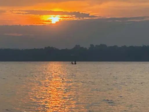 Calm waters at sunset reflecting on family legacy and long-term wealth planning — Absolute Wealth Advisers Sydney