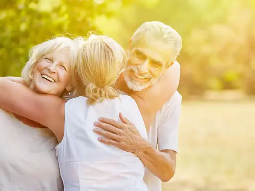 High net worth family embracing outdoors — smart tax planning and intergenerational wealth management with Absolute Wealth Advisers Sydney.