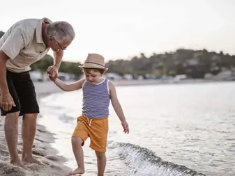 Grandparents with grandchild representing intergenerational wealth transfer and inheritance planning Sydney
