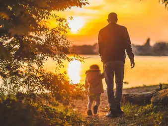 Father and son going for a morning walk