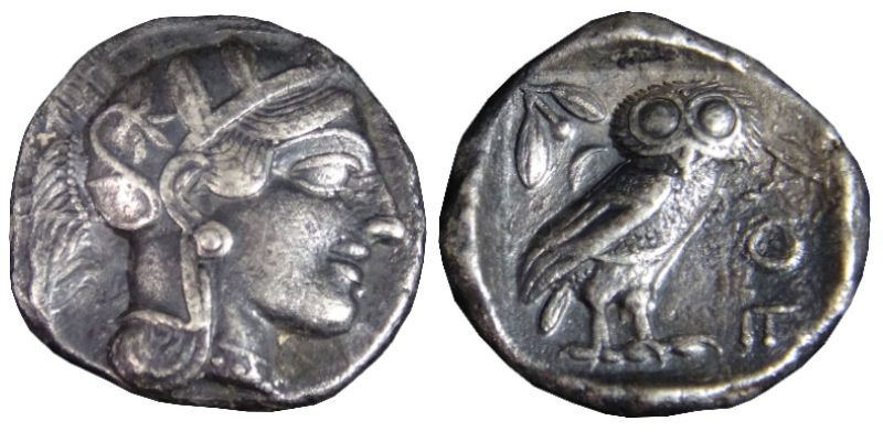 An ancient Athenian Tetradrachm showing Athena and her owl