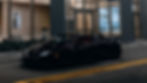 Close-up view of a sleek Lamborghini Huracan parked in front of a luxurious Miami beach house