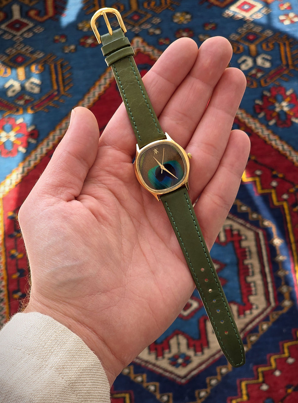 Thumbnail: 92. Peacock feather watch