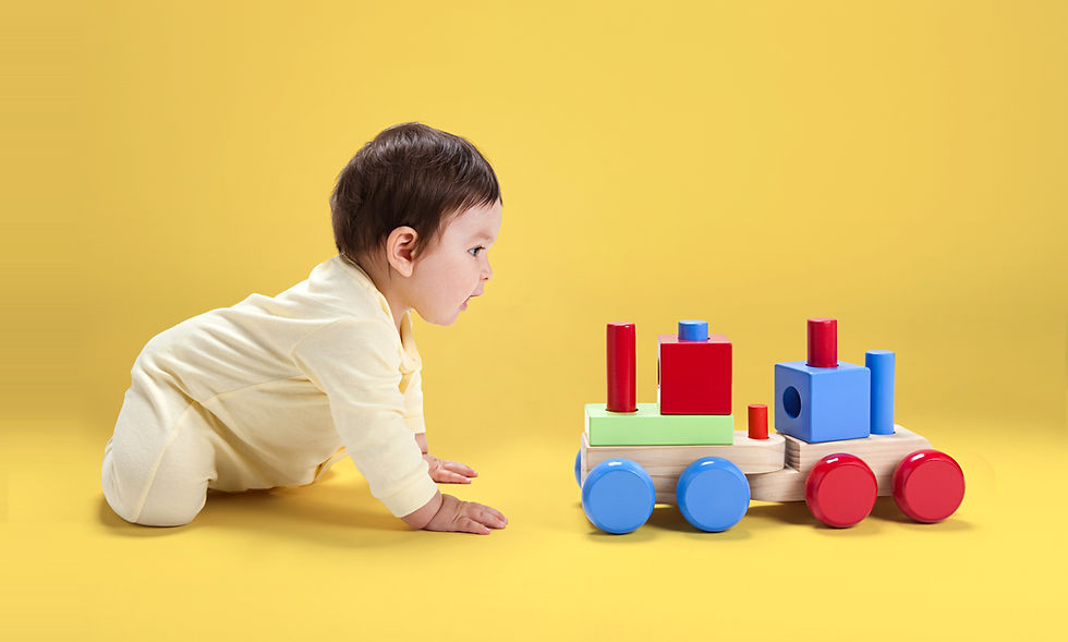 Baby with Wooden Toy