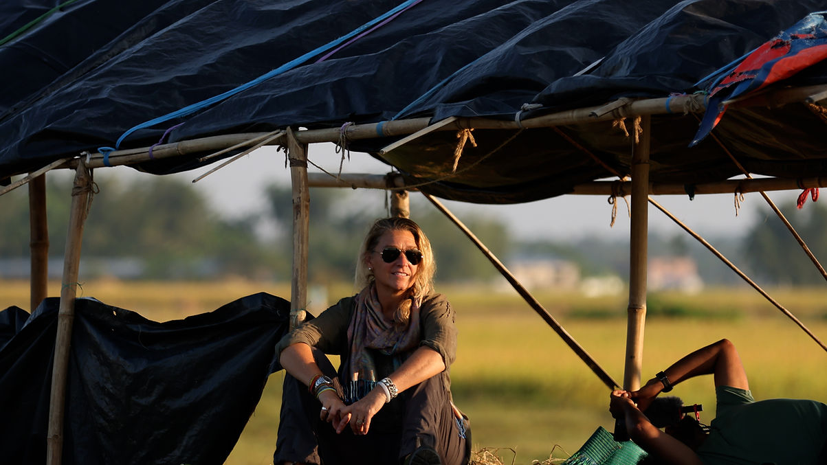 Kim in field photo by Jeremy LaZelle copy.jpg