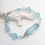 Thumbnail: Frosted Ice Blue Crystal and Lampwork Glass Sterling Silver Bracelet