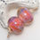Thumbnail: Coral Lustre with Silver Bubbles Lampwork Glass Bead Pair