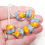 Thumbnail: Pastel Rainbow Striped Nuggets Lampwork Glass Bead Set