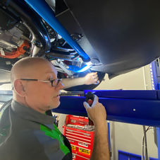 Working on wheel alignment.jpg