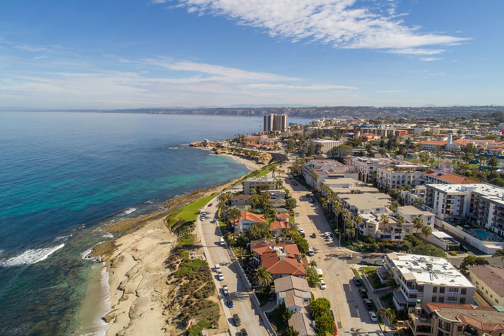 Aerial of the coastline in the Village of La Jolla taken on  a sunny day.