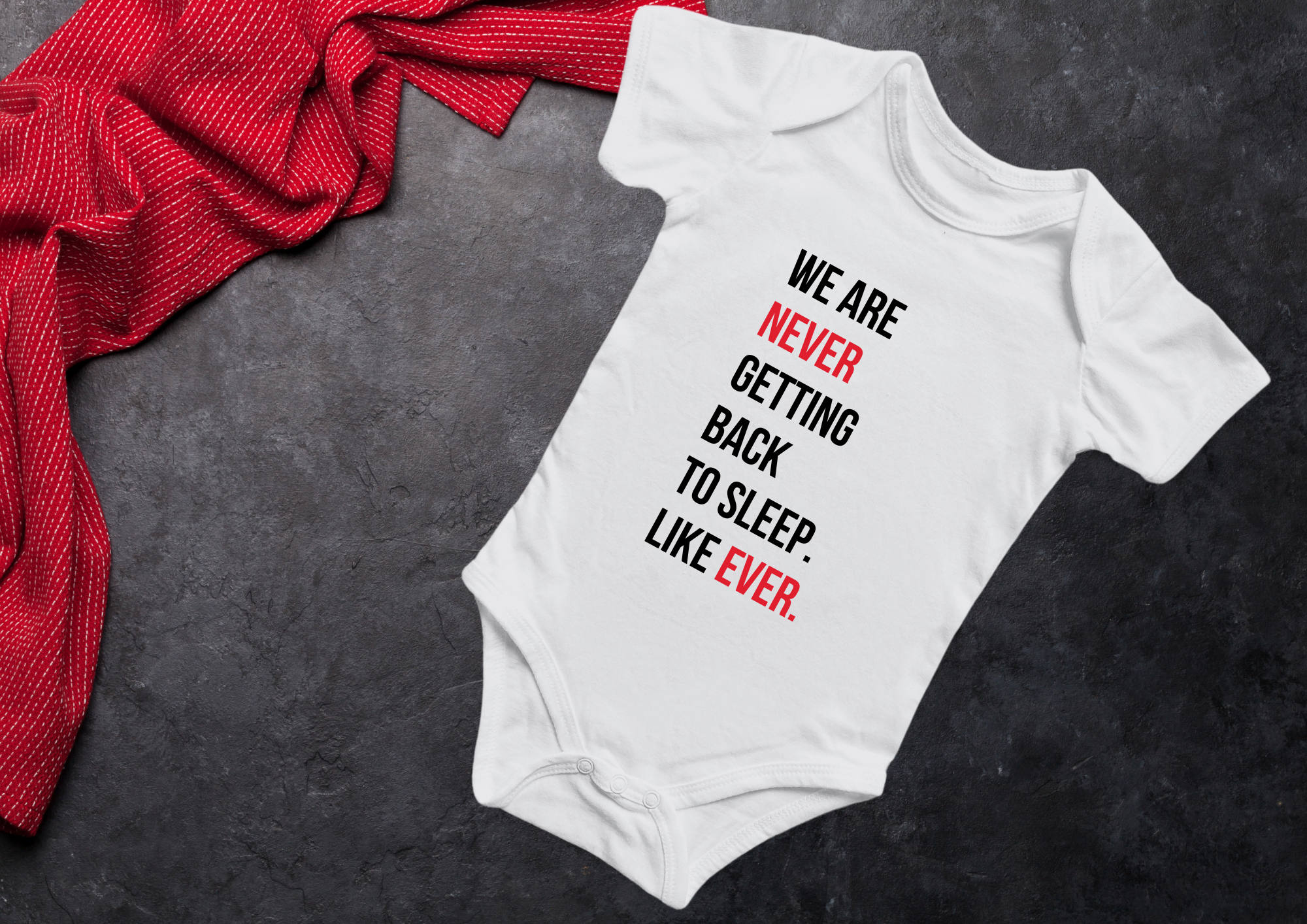 Personalised baby onesie inspired by Taylor Swift lyrics that says "We are never getting back to sleep like ever"