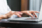 close-up-woman-s-hand-using-laptop.jpg