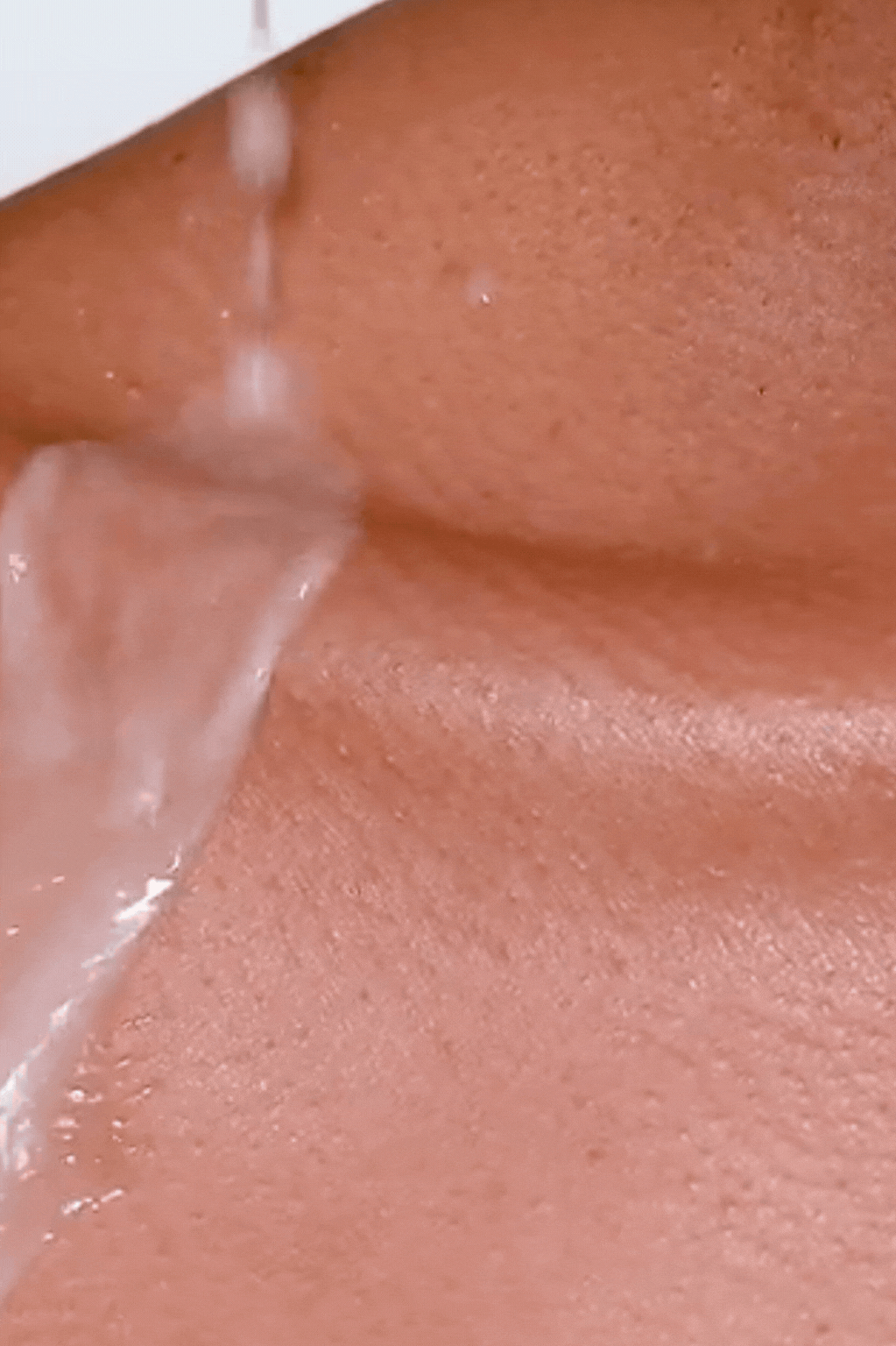 milk dropping on the collarbone to showcase rhode glazing milk