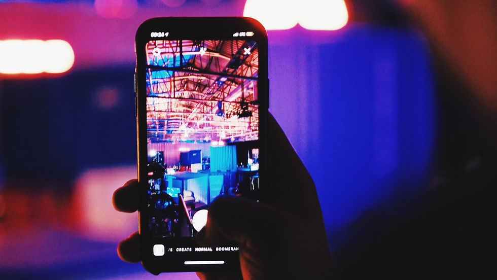 Person holding phone creating Instagram story