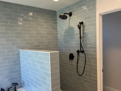 Walk-in shower with blue-gray tile in Oceanside master bathroom remodel