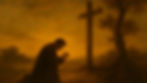 Portrait of a man kneeling at a cross and praying