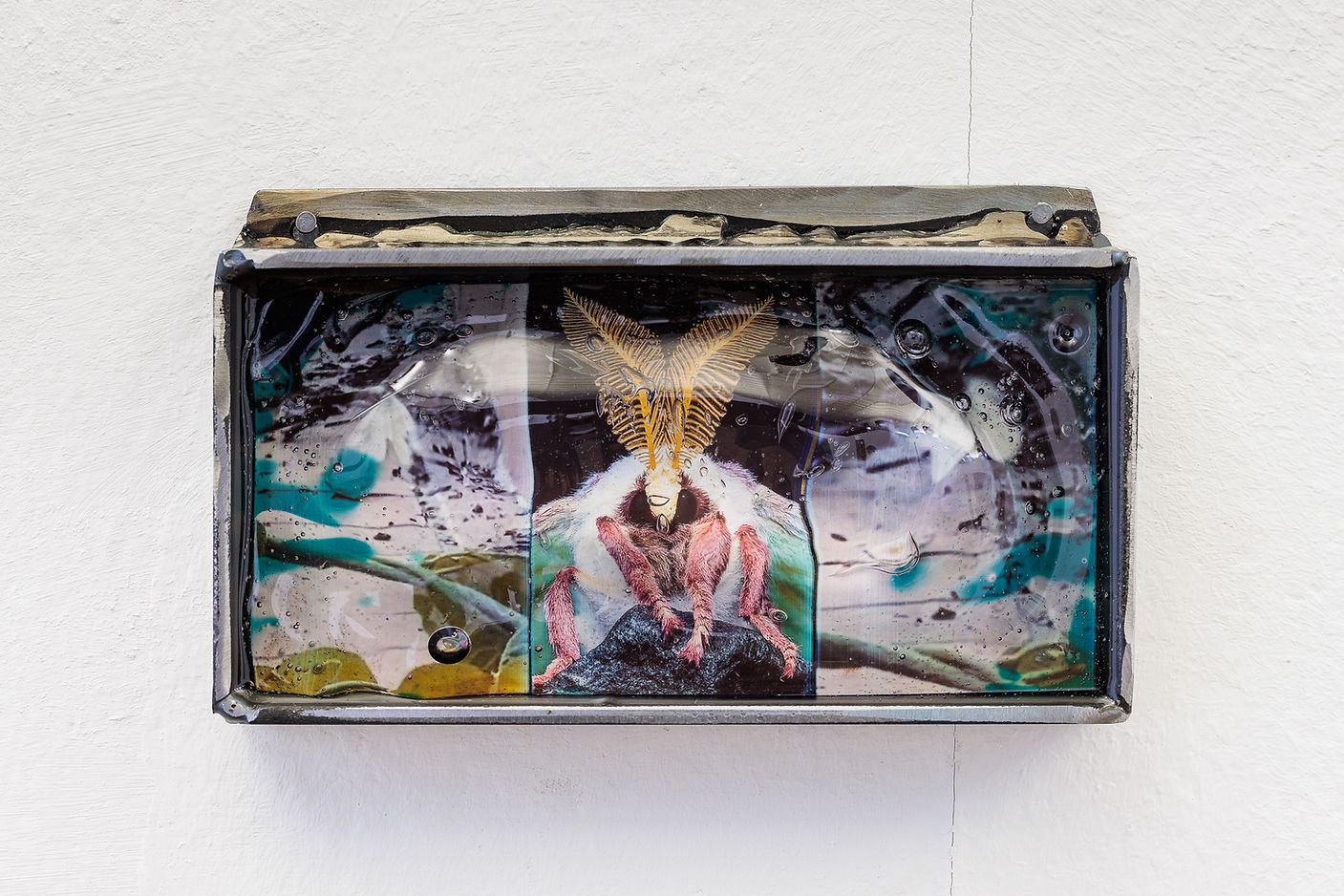 Invasive Memory, 2023, steel, photo print, glass wax, 8 cm x 16 cm x 3 cm