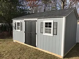 window shutters on storage shed