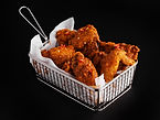 high-angle-shot-basket-delicious-fried-chicken-black-surface.jpg