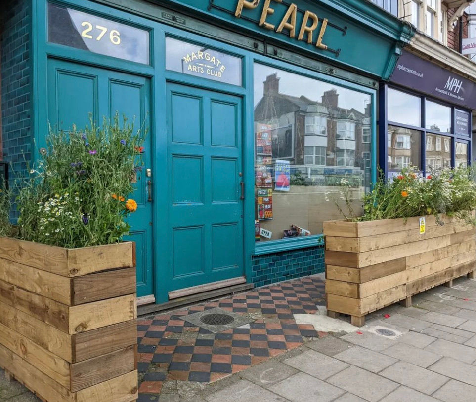 A teal coloured shopfront