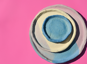 blue and white clay plates pink background edited.png