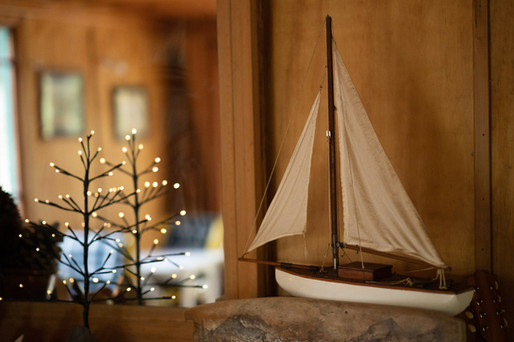 Sail boat Nydia Bay Track Lodge Mirror reflection