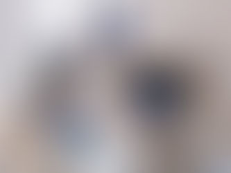 Cleaning crew tidying up a modern office space.