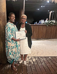 Elsa Davis receives her Certified Honeymoon & Destination Wedding Travel Specialist