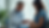Eye-level view of a healthcare professional discussing medication with a pregnant woman