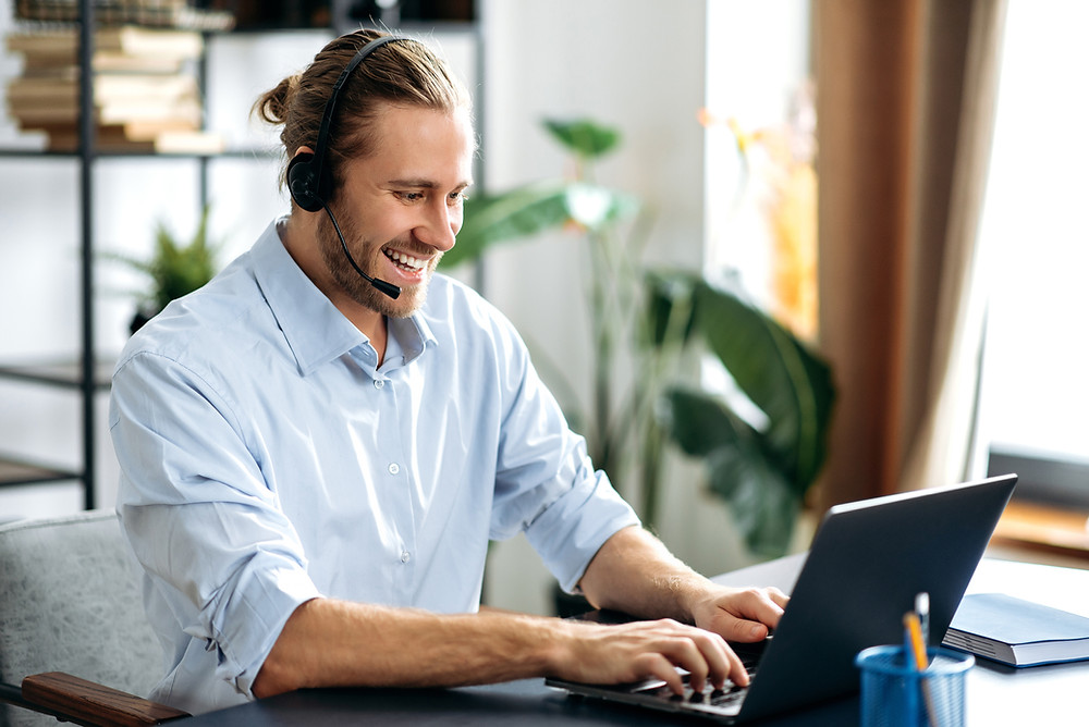Insurance agency staff member makes calls to clients to set appointments