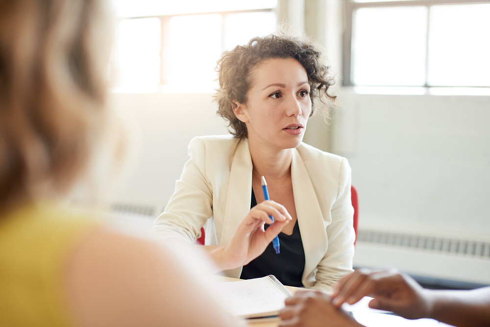 Insurance agent meets with customers to review their coverage.
