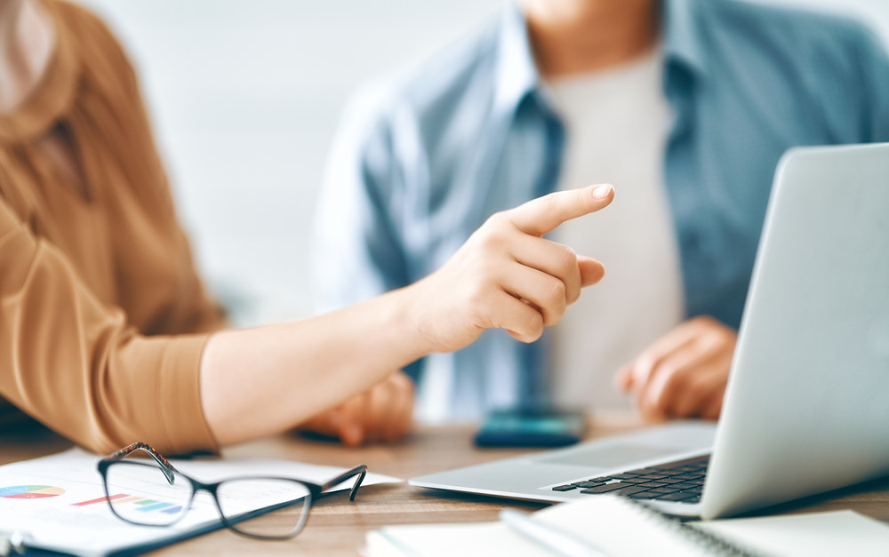 Agency manager works with staff to identify prime customers to ask for referrals.