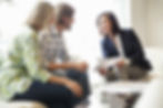 Insurance agent teaches clients about their coverage options.