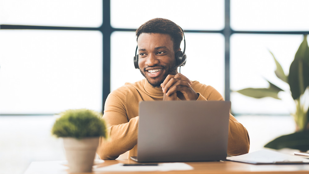 Insurance agency staff member calls clients to set up annual customer insurance review appointments.