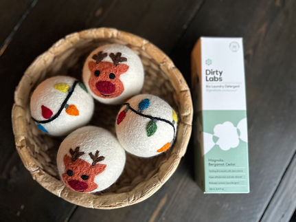 4 dryer balls and dirty labs laundry detergent.jpeg