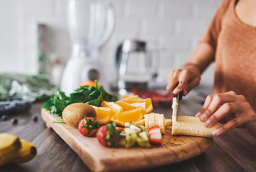 Woman cutting fruit