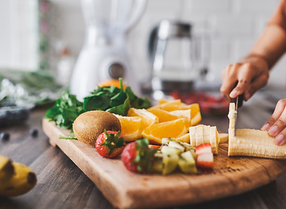 Woman cutting fruit