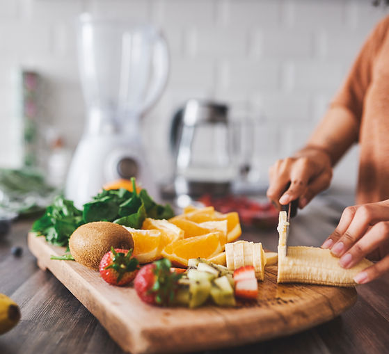 Woman cutting fruit