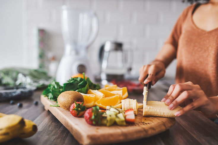 Woman cutting fruit