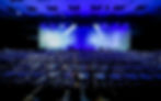 SBI leadership event venue with immersive learning stage and executive seating, preparing leaders for disruption and change.