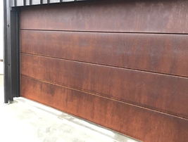 Designer Garage Doors, Bespoke , Custom Made, Sectional Doors, Corten Steel, Barn style, Cedar, Corrugated iron, tray clad,  