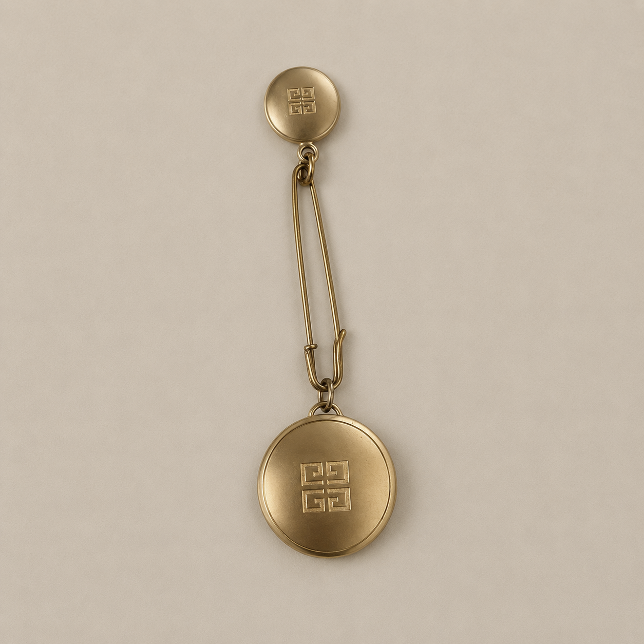 The Givenchy Medallion Brooch